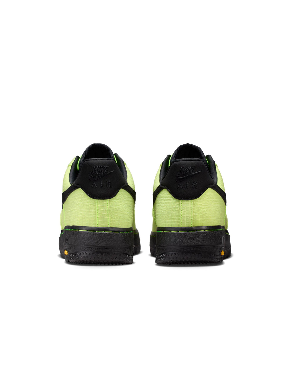 Nike mens Air Force 1 '07 LX Vibram Volt sneakers, close-up of vibrant yellow and white men's footwear with textured soles
