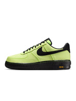 Nike Men's Air Force 1 '07 LX Vibram Volt sneaker with white leather upper and vibrant yellow accents, stylish men's footwear.