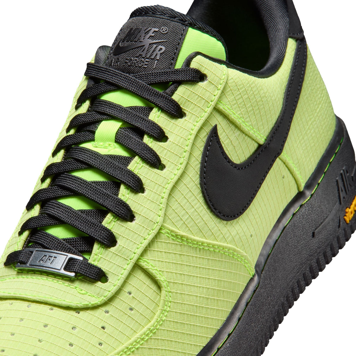 Nike Mens Air Force 1 '07 LX Vibram Volt sneakers, black and yellow colorway, featuring classic design with Vibram sole details