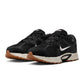Nike men's V5 RNR footwear in black with gum soles, showcasing stylish athletic shoes with a sleek design and comfortable fit.
