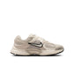 Nike women's V5 RNR Light Orewood Brown sneakers showcasing stylish brown athletic footwear for women.