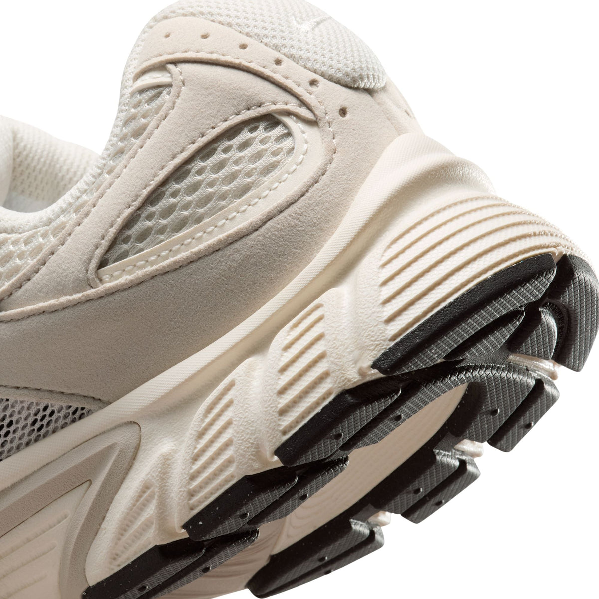 Nike women's V5 RNR light Orewood Brown sneakers, stylish footwear with a sleek design, shown in a natural side view.
