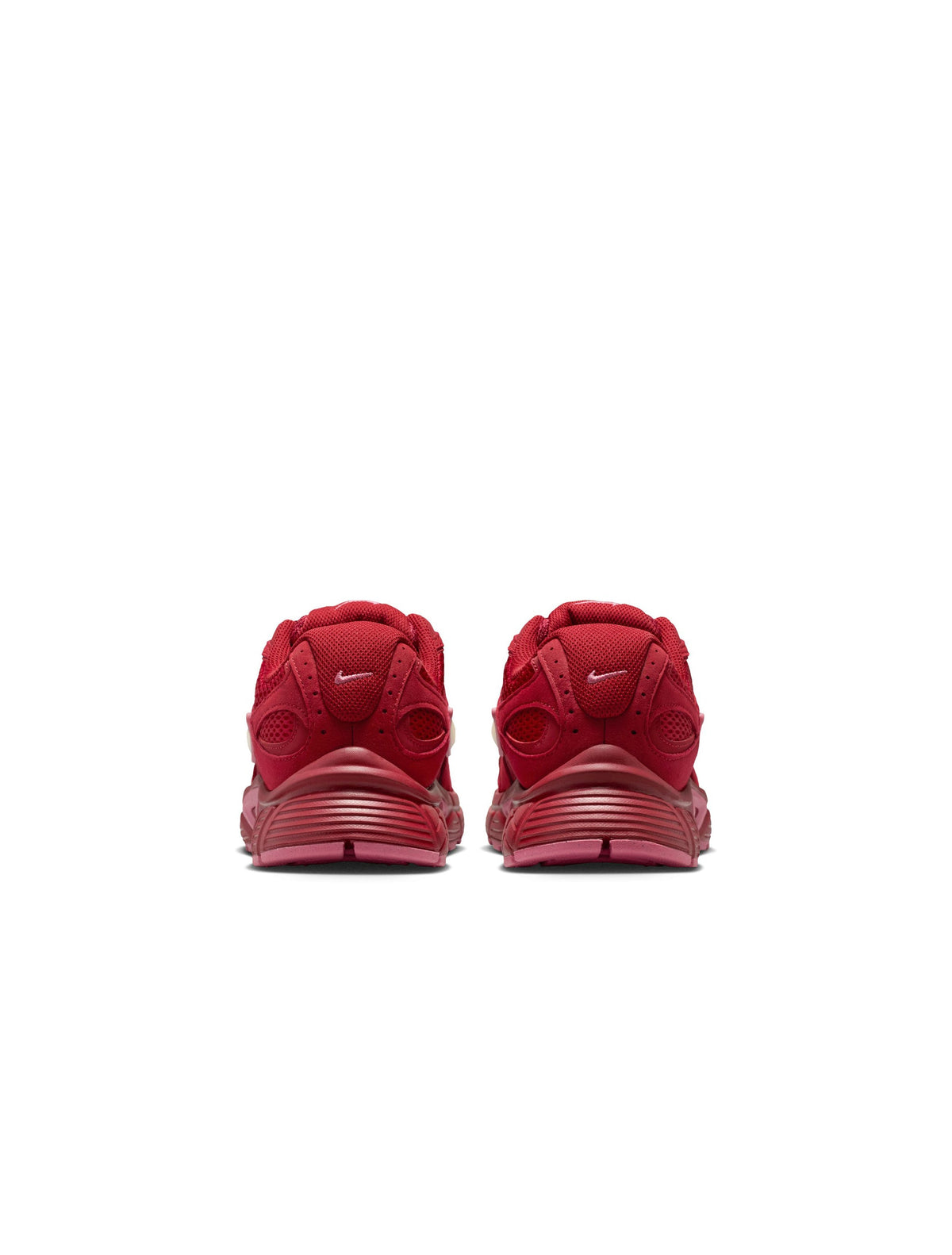 Nike women's V5 Runner sneakers in Team Crimson, side view with visible branding and athletic sole