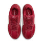Nike Women's V5 Runner Team Crimson sneakers by Denim Exchange, side view