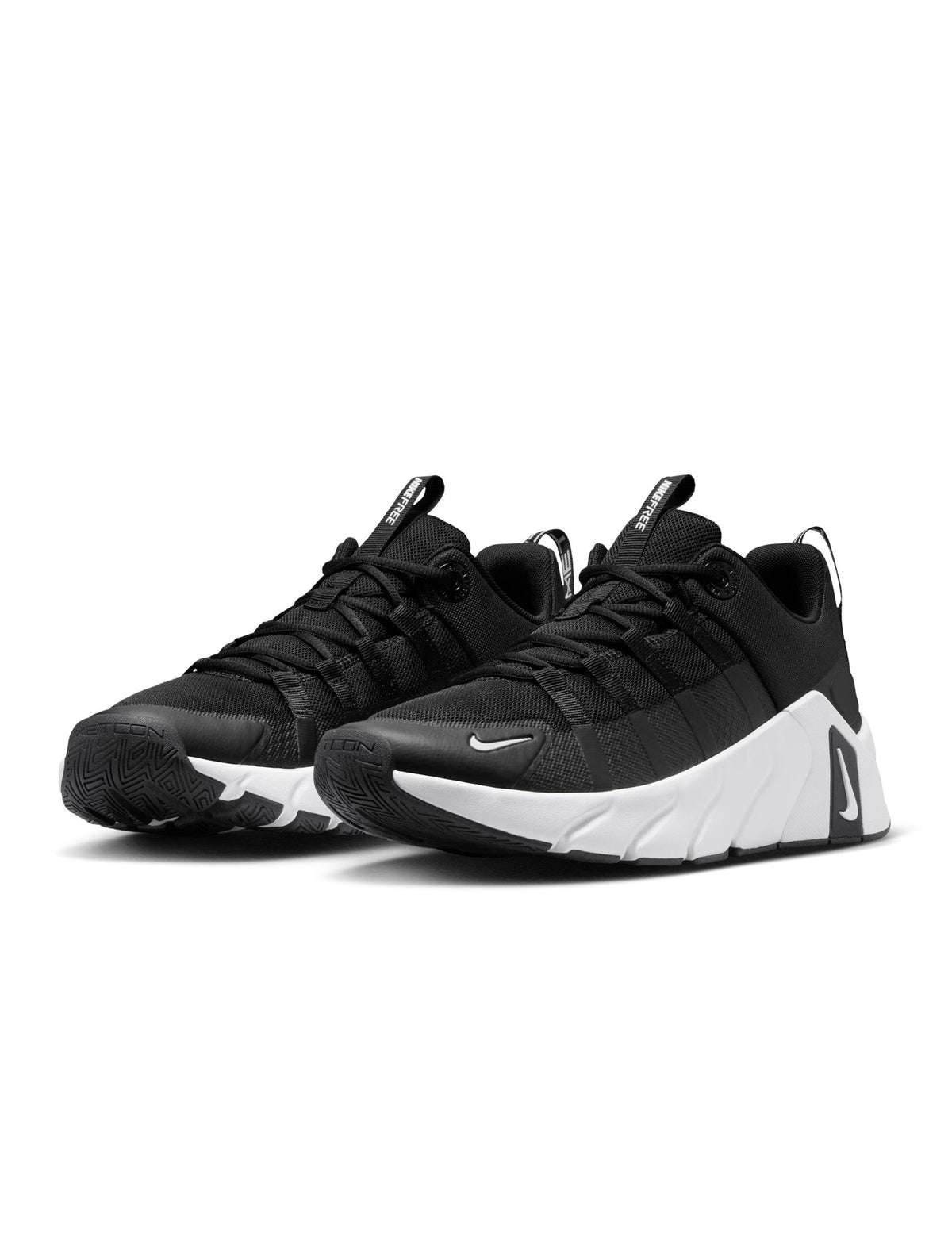 Black and white Nike Men's Free Metcon 7 training shoes, side view