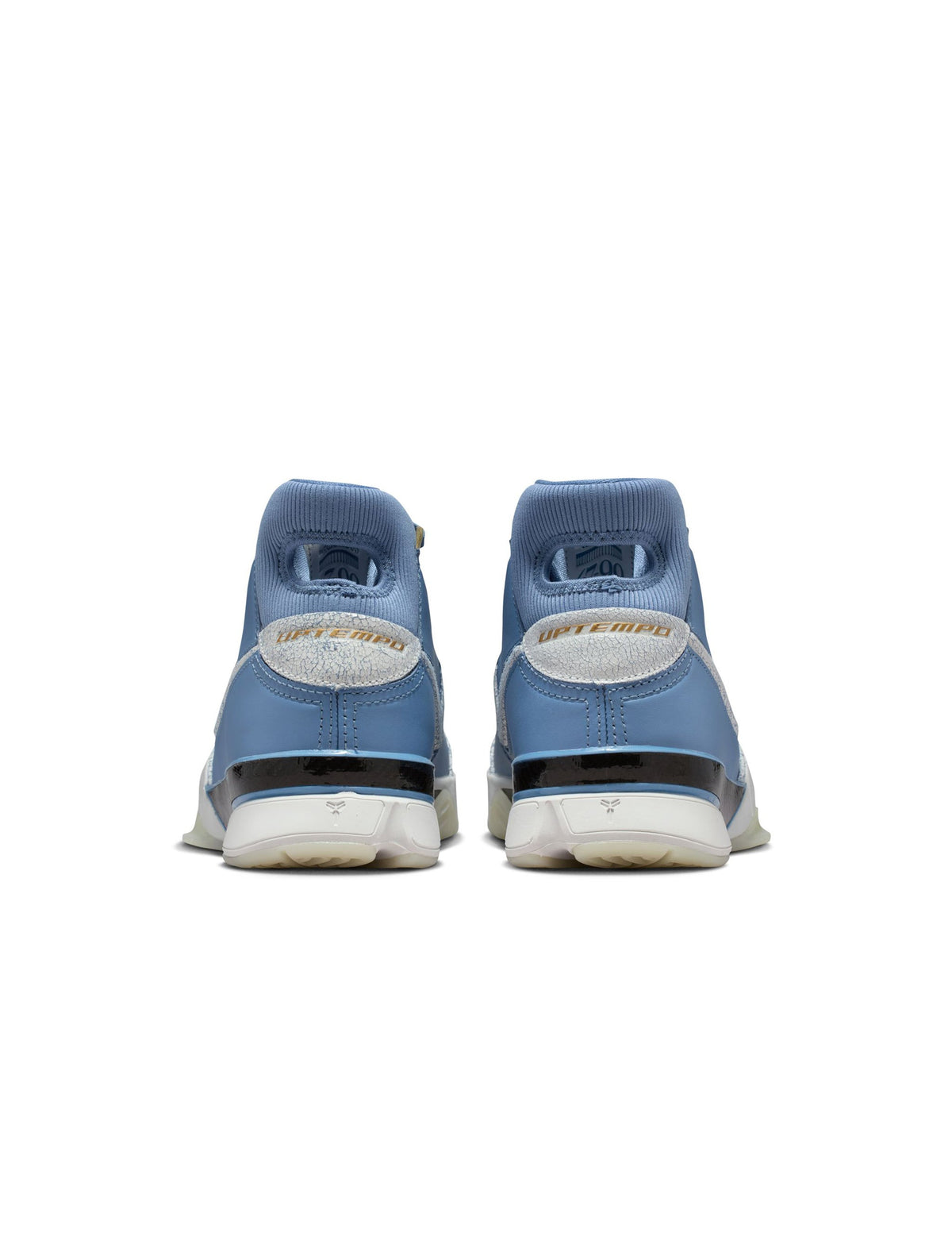 Nike Kobe I Protro City of Champions men's footwear in blue and white, featuring Nike branding and a sleek athletic design.