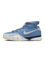 Men's Nike Kobe I Protro City of Champions footwear in black and purple with Nike branding and athletic design.