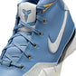 Nike Men's Kobe I Protro City of Champions sneakers in blue and white, showcasing their stylish design and athletic footwear features.