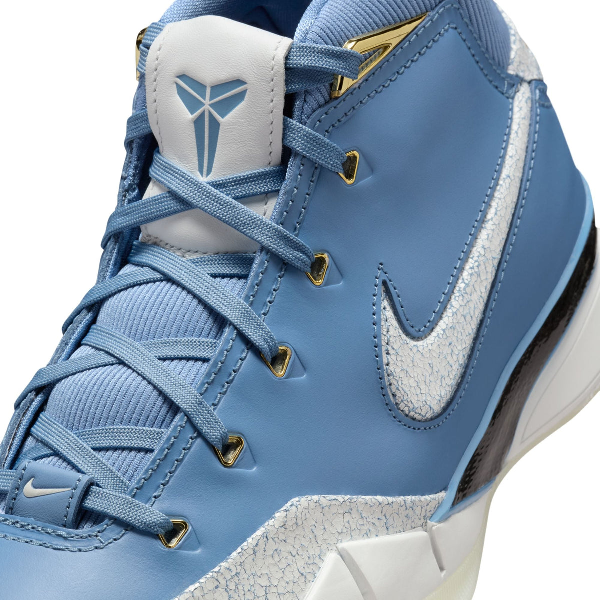 Nike Men's Kobe I Protro City of Champions sneakers in blue and white, showcasing their stylish design and athletic footwear features.