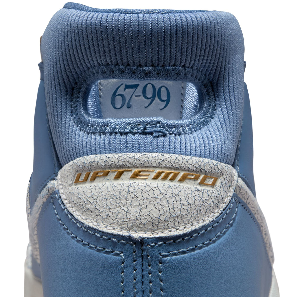 Nike Men's Kobe I Protro City of Champions sneakers, blue and white athletic footwear with Kobe logo details.