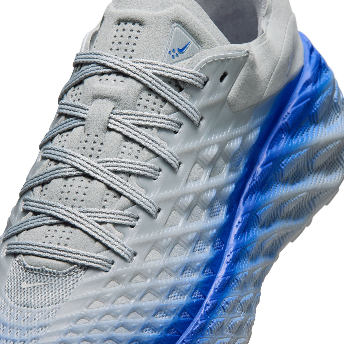 Nike men's Ava Edge Wolf Grey footwear, showing the stylish grey sneaker with textured design and Nike branding.