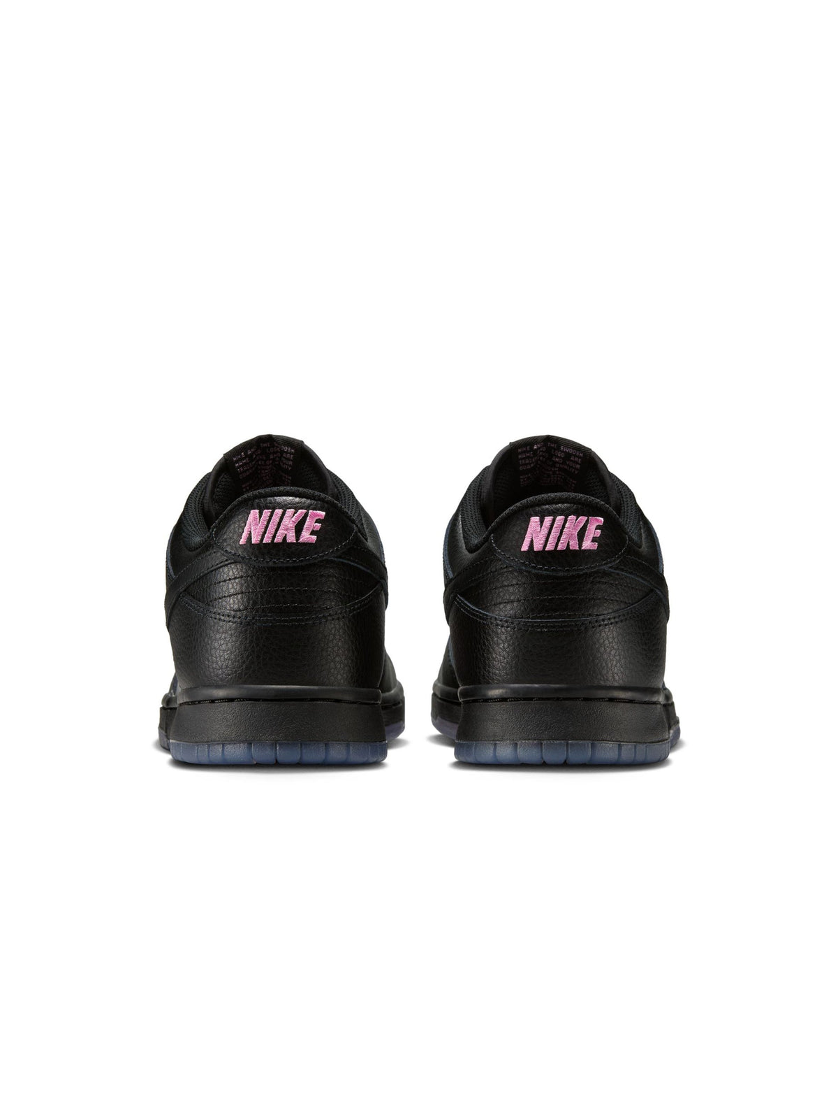 Nike Men’s Dunk Low Retro Premium sneakers in Pink Rise with white accents, showcasing stylish men's footwear.