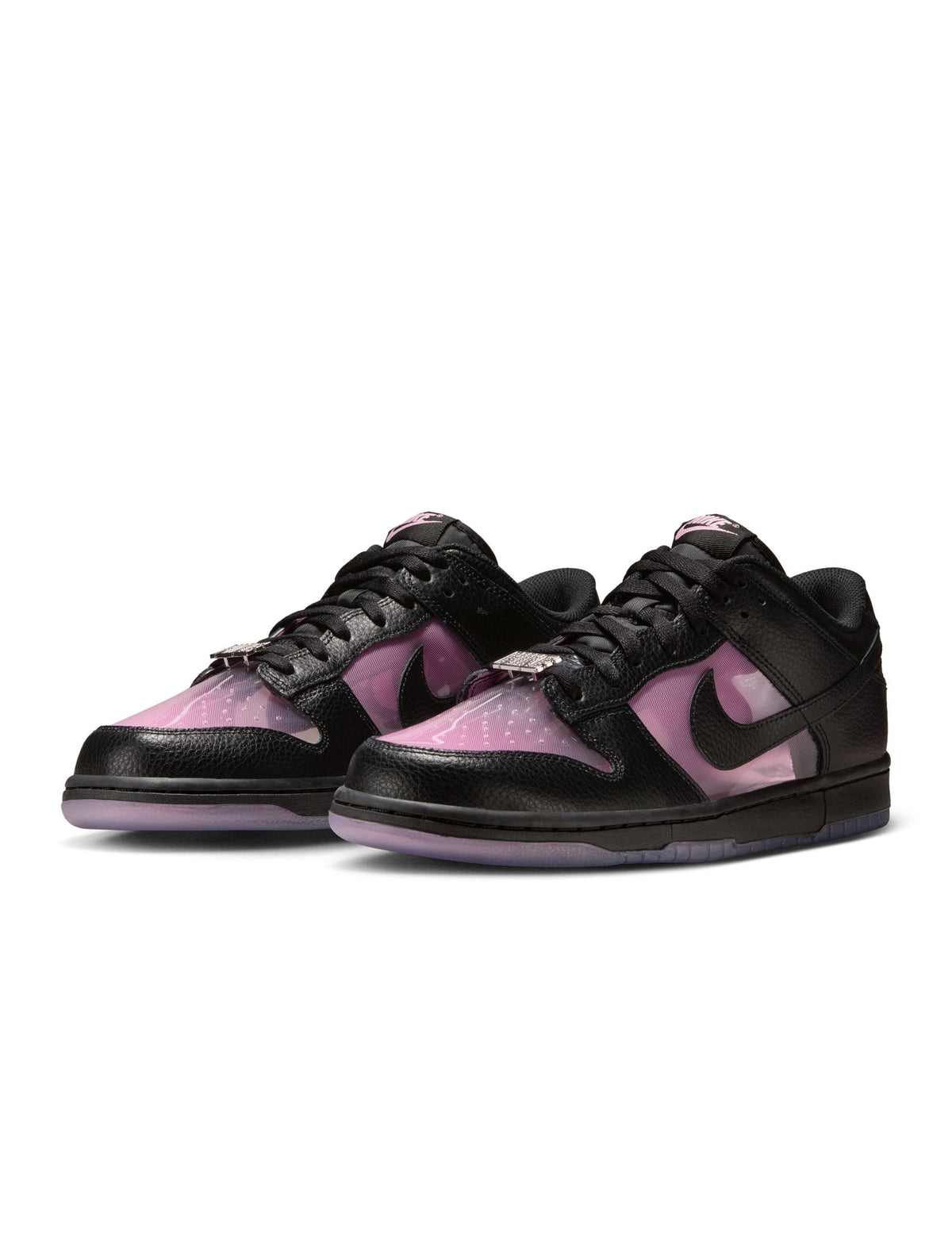 Nike Men's Dunk Low Retro Premium sneakers in pink Rise with white accents, showcasing a stylish and vibrant men's footwear design.