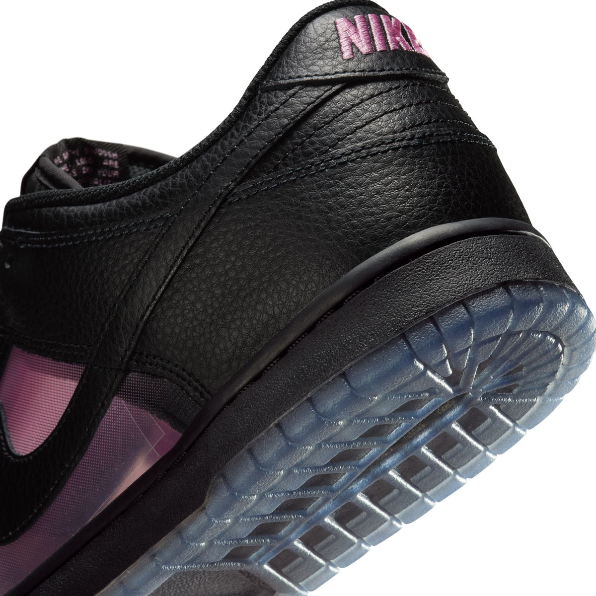 Nike Men's Dunk Low Retro Premium Pink Rise sneakers in pink and white, featuring stylish design and premium materials.