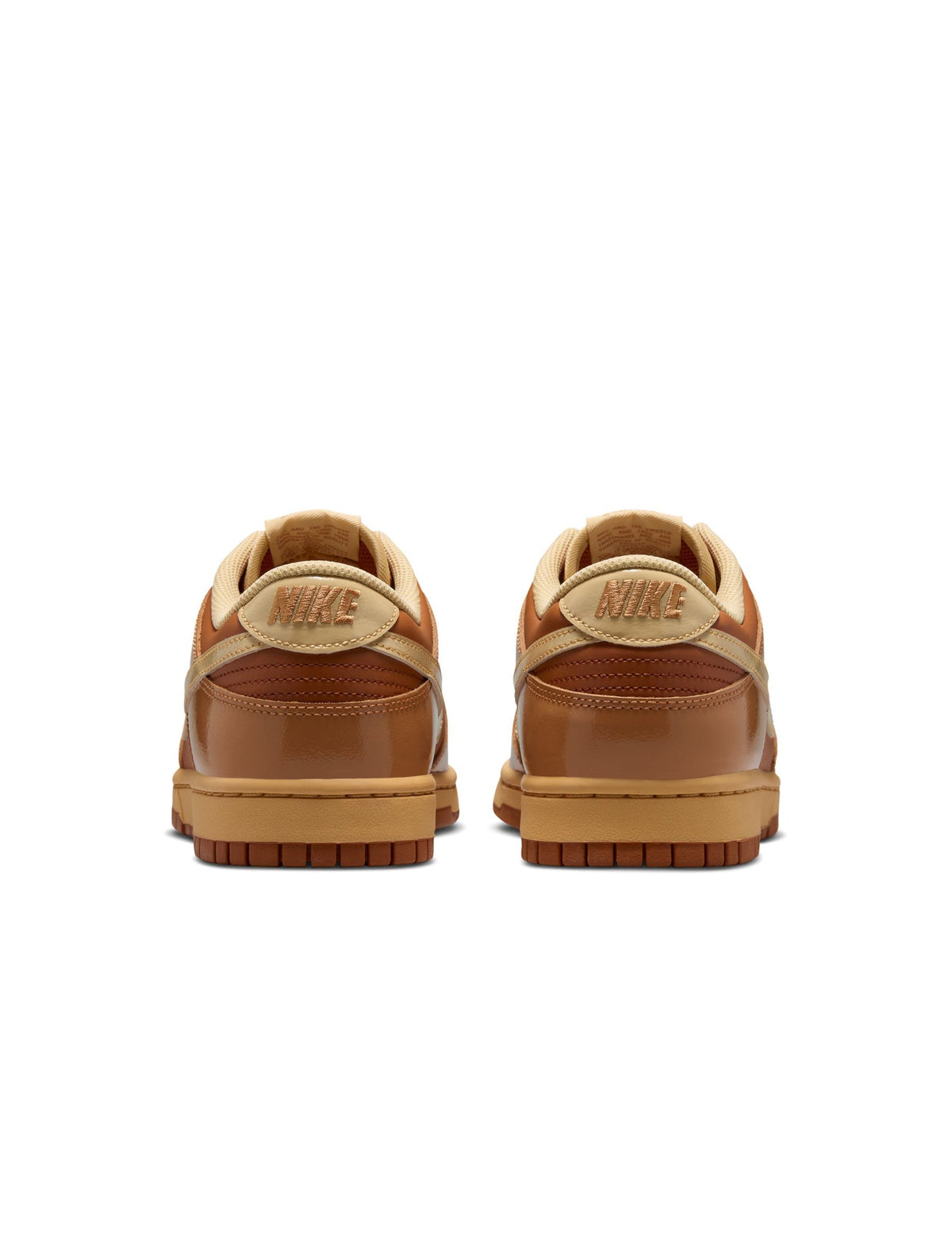Nike Mens Dunk Low Retro Sesame sneakers, casual men's footwear in beige and brown tones, displayed on a clean background.