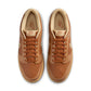 Nike Mens Dunk Low Retro Sesame sneakers, denim-style men's footwear with a tan and cream color scheme, on a white background.
