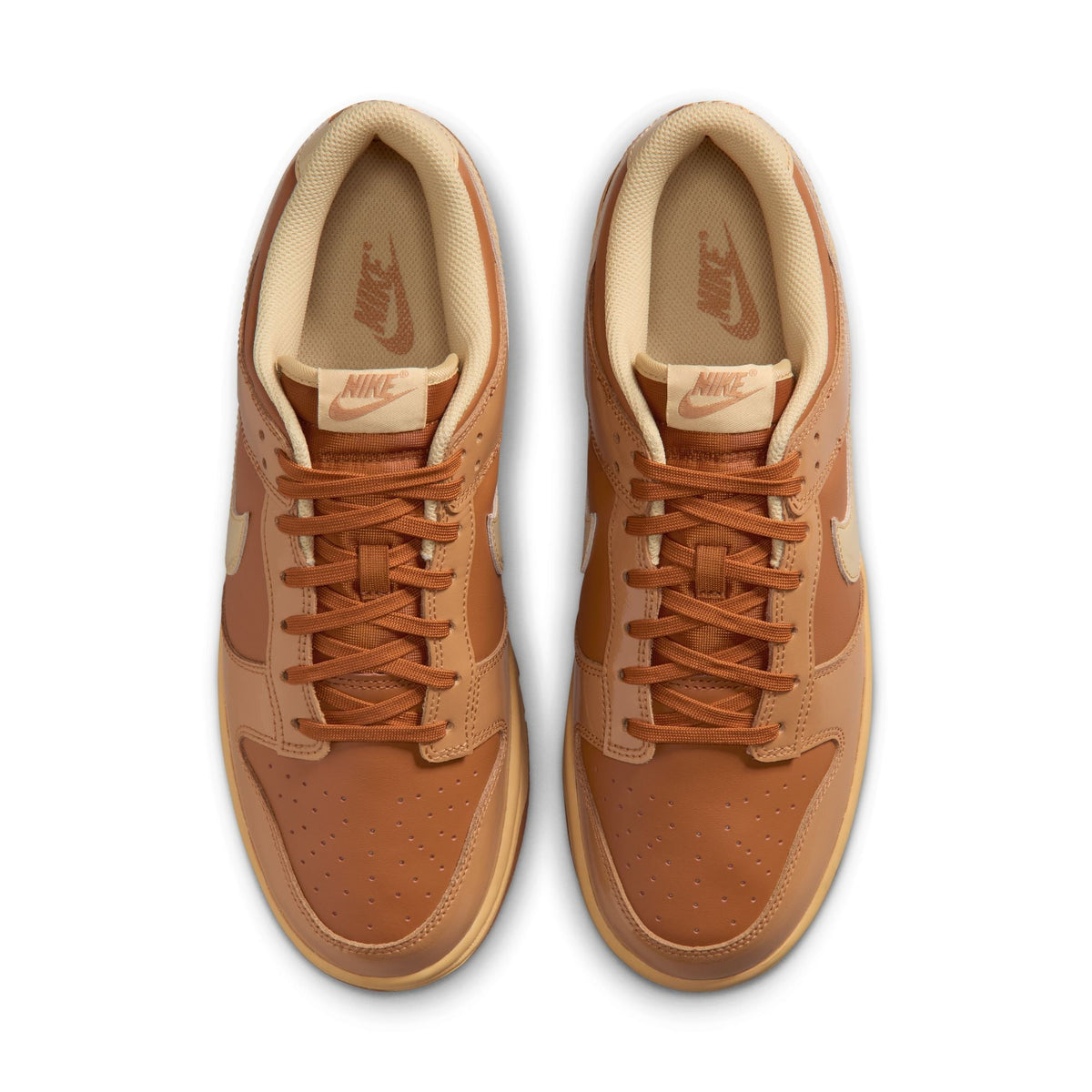 Nike Mens Dunk Low Retro Sesame sneakers, denim-style men's footwear with a tan and cream color scheme, on a white background.