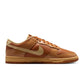 Nike Mens Dunk Low Retro Sesame footwear with beige and brown suede panels, white midsole, and Nike branding.