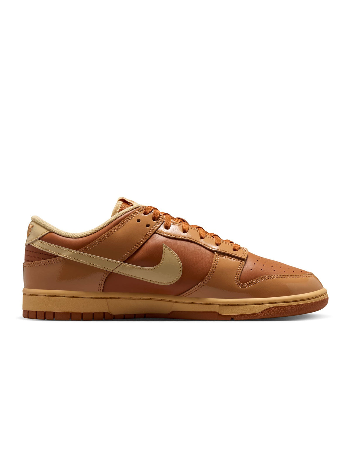 Nike Mens Dunk Low Retro Sesame footwear with beige and brown suede panels, white midsole, and Nike branding.