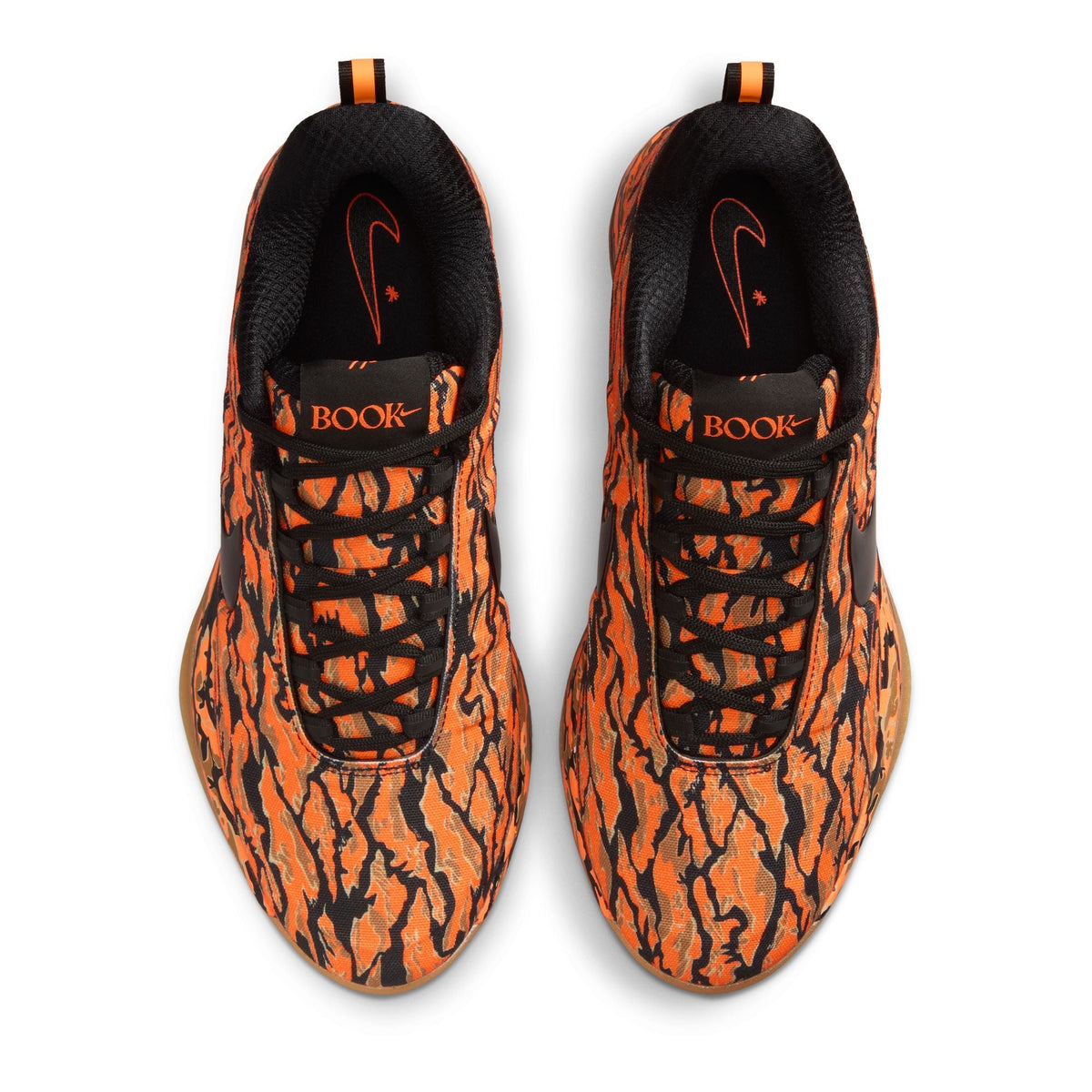 Nike men's Book 2 Tiger Camo sneakers featuring camouflage pattern and athletic design, displayed on a plain background.