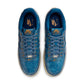 Nike men’s Air Force 1 Retro patent denim sneakers by Denim Exchange in blue and white.