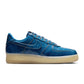 Men's Nike Air Force 1 Retro sneakers in patent denim, side view-semis.