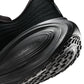 Nike men's Vomero Plus black sneakers from Denim Exchange, side view.