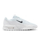 White Nike Air Max Bia men's footwear with breathable mesh upper and cushioned sole, displayed on a plain background.