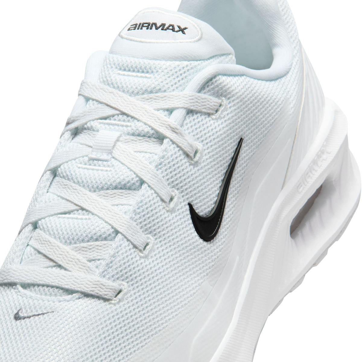 Nike Men's Air Max Bia white sneakers, showcasing sleek white athletic footwear with Nike branding and modern design details.