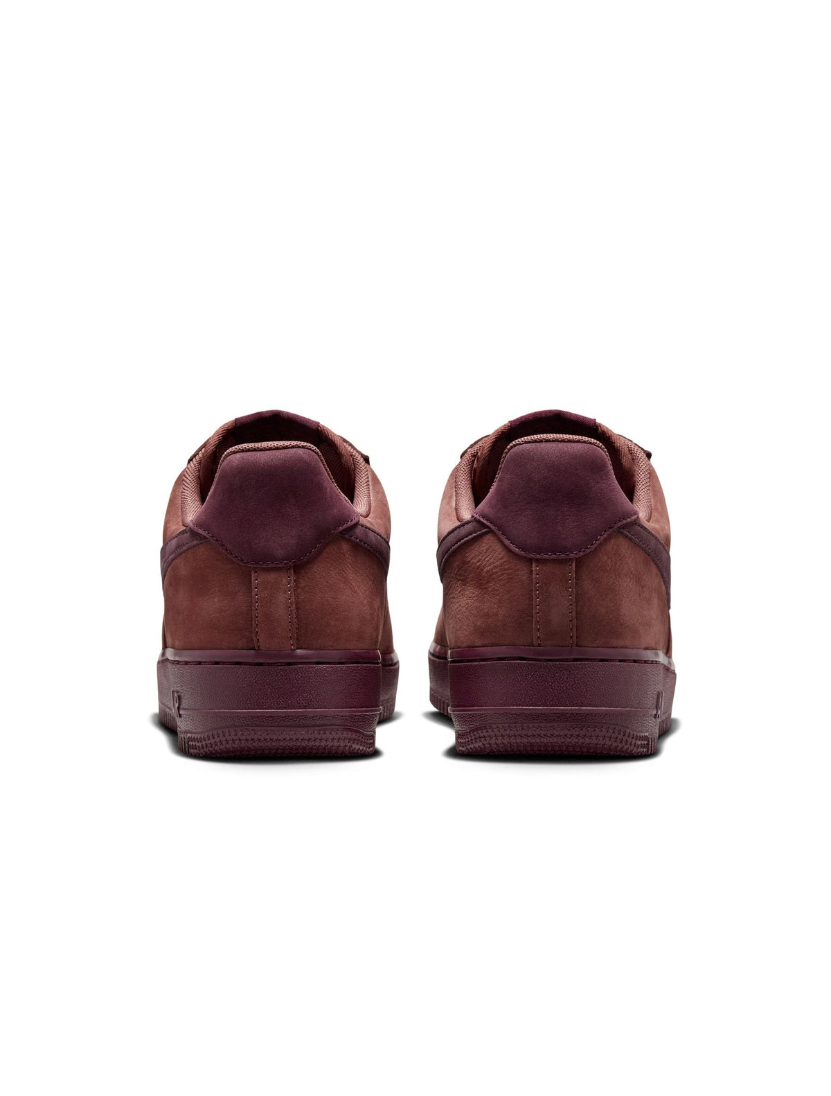 Nike men's Air Force 1 Low Retro Premium sneakers in Red Sepia; side view of low-top footwear