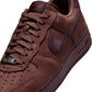 Nike men's Air Force 1 Low Retro Premium sneakers in Red Sepia, side view