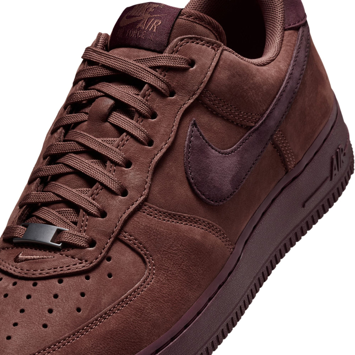 Nike men's Air Force 1 Low Retro Premium sneakers in Red Sepia, side view