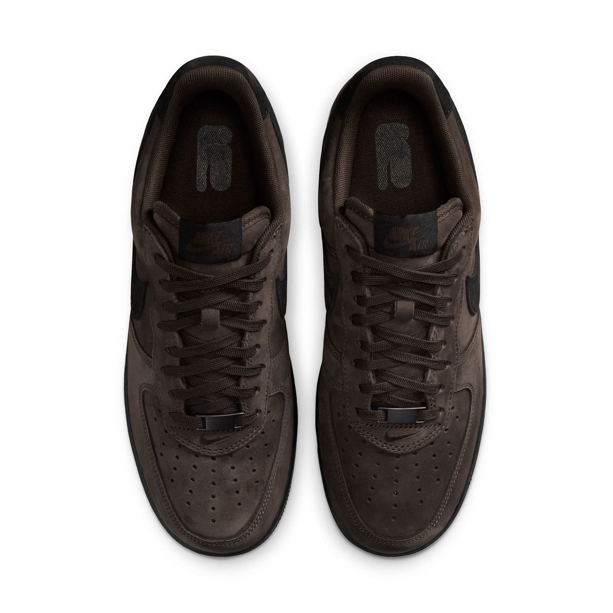 Black Nike Air Force 1 Low Retro Premium men's footwear with white soles and classic design, shown from a side angle.
