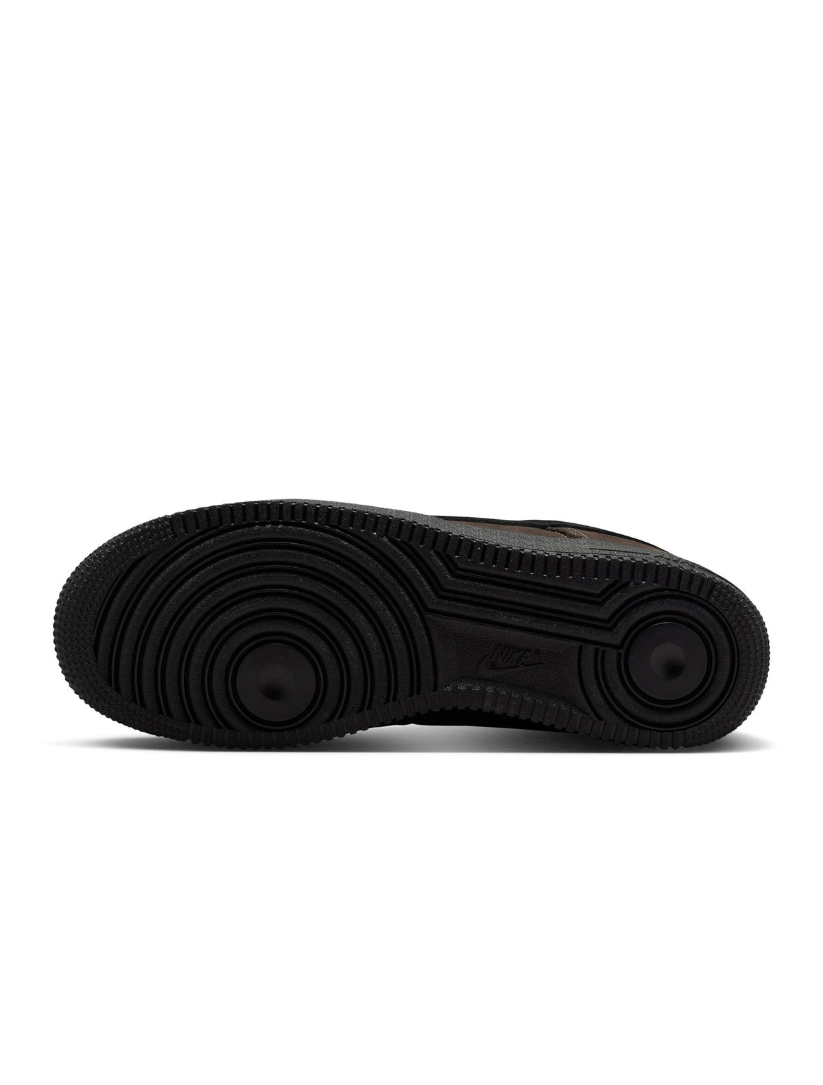 Black Nike Air Force 1 Low Retro Premium men's sneakers with white soles and Nike swoosh, displayed on a white background.