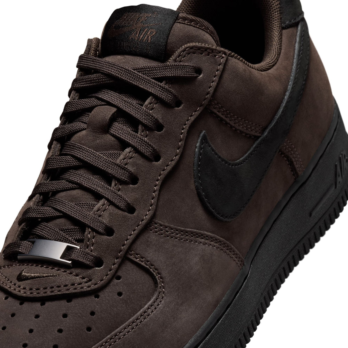 Nike Air Force 1 Low Retro Premium men's black tea sneakers, casual footwear with classic design and premium materials.