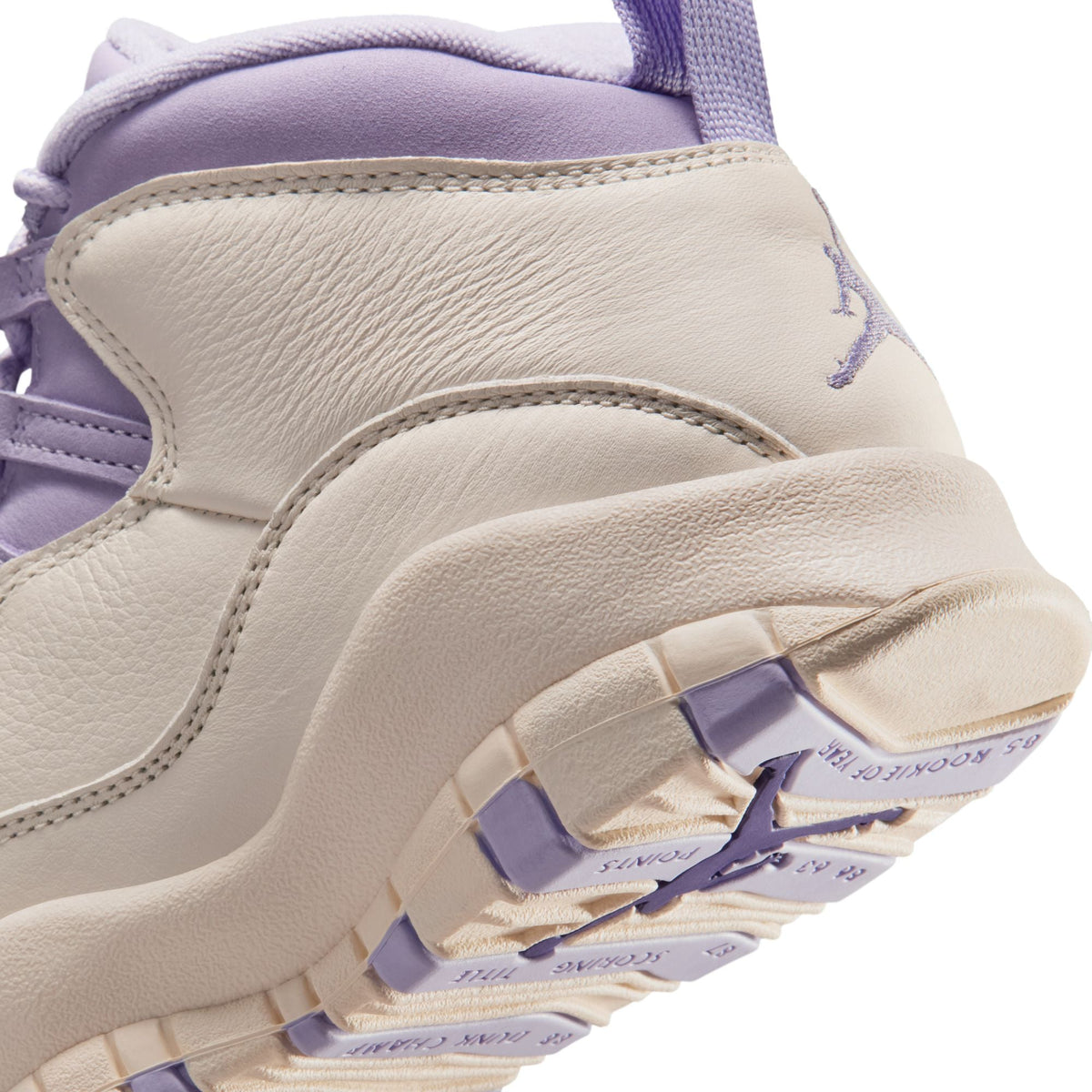 Women’s Air Jordan 10 Retro Hydrangeas sneakers by Denim Exchange in white and purple tones