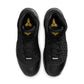 Nike Kobe III Low Protro men's footwear in Orca color, featuring sleek black and white design with Nike branding.