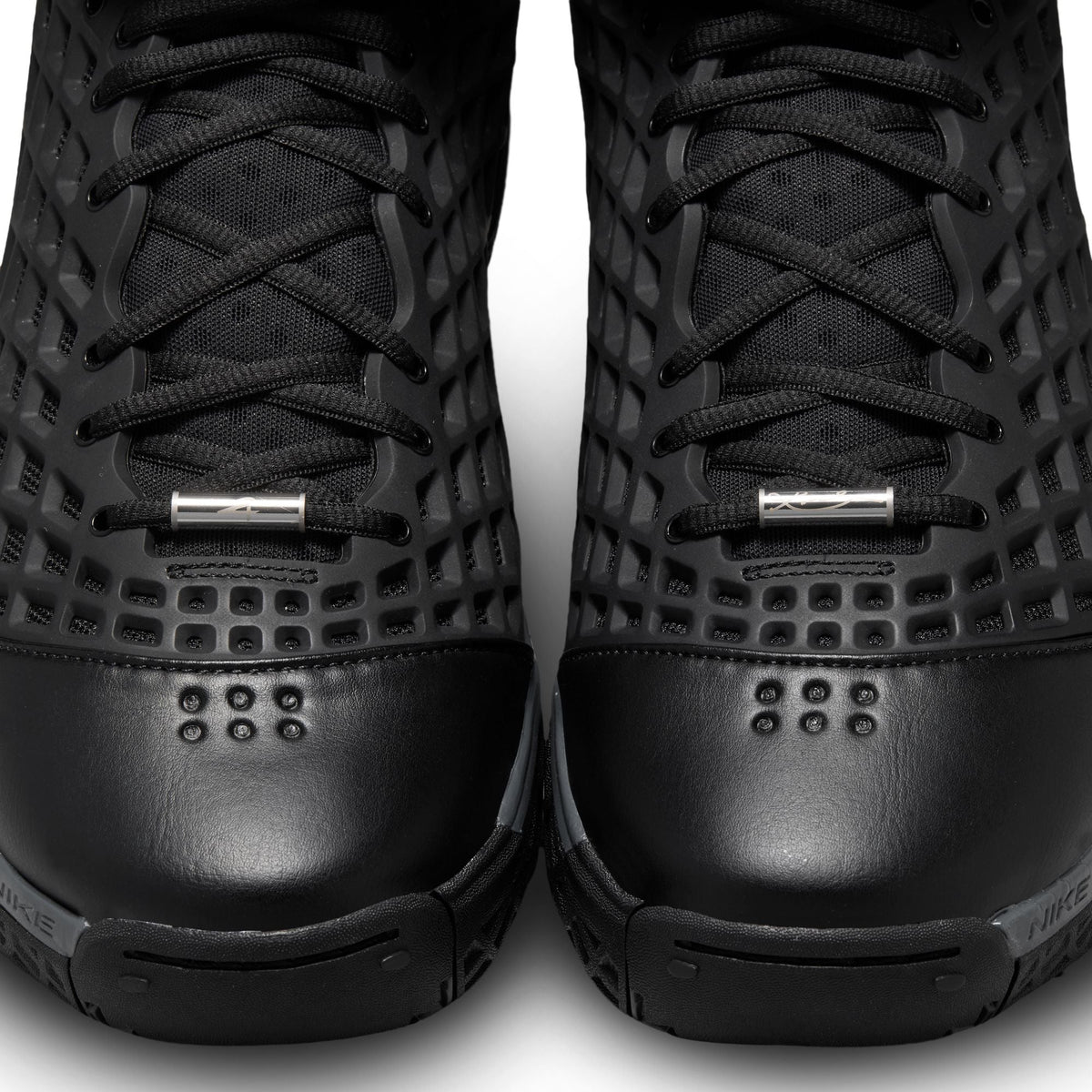 Nike Kobe III Low Protro men's footwear in Orca colorway, featuring black and white design with Nike branding and low-top style.