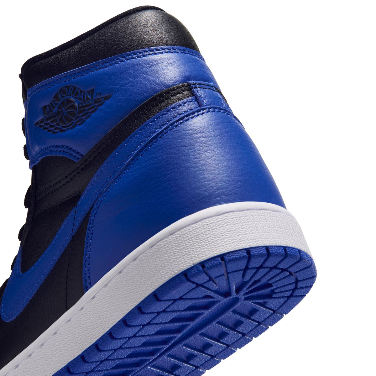 Mens Air Jordan Retro 1 High OG Royal sneakers by Denim Exchange, featuring blue leather and classic high-top design.