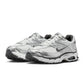 Nike Men's Air Max Moto 2K sneakers in Photon Dust gray with modern athletic design