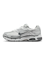 Nike Mens Air Max Moto 2K footwear in Photon Dust, side view showing sporty mesh and layered sole design