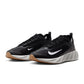 Black and white Nike men's Ava X Mesh footwear with breathable mesh design and stylish athletic look.