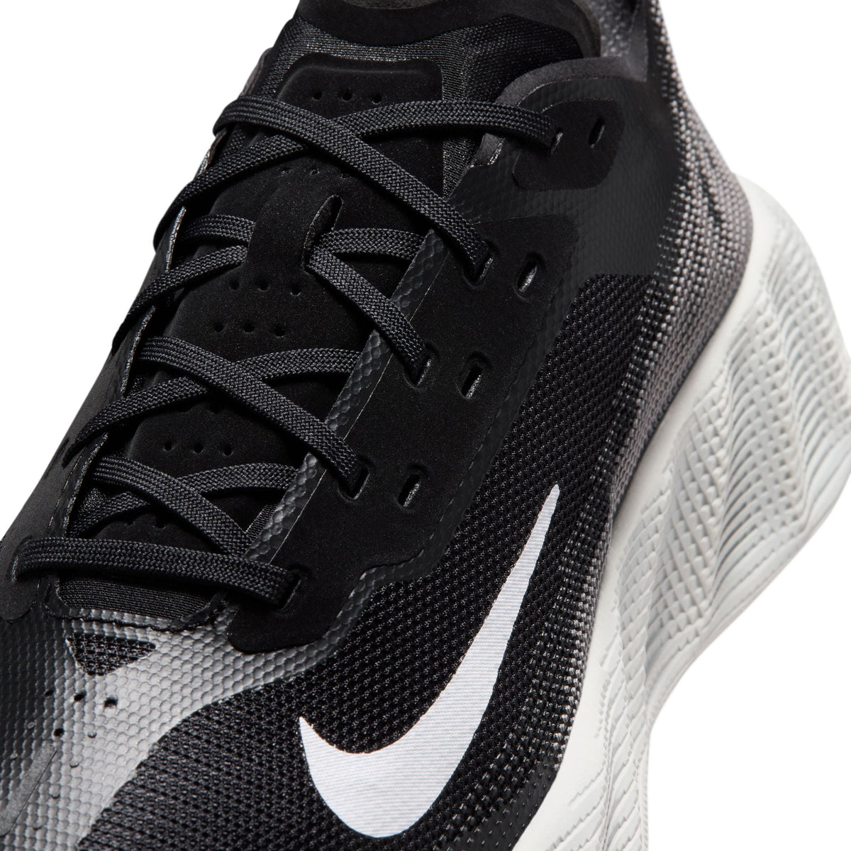 Nike Mens Ava X Mesh black and white athletic footwear with breathable mesh uppers, designed for comfort and style.