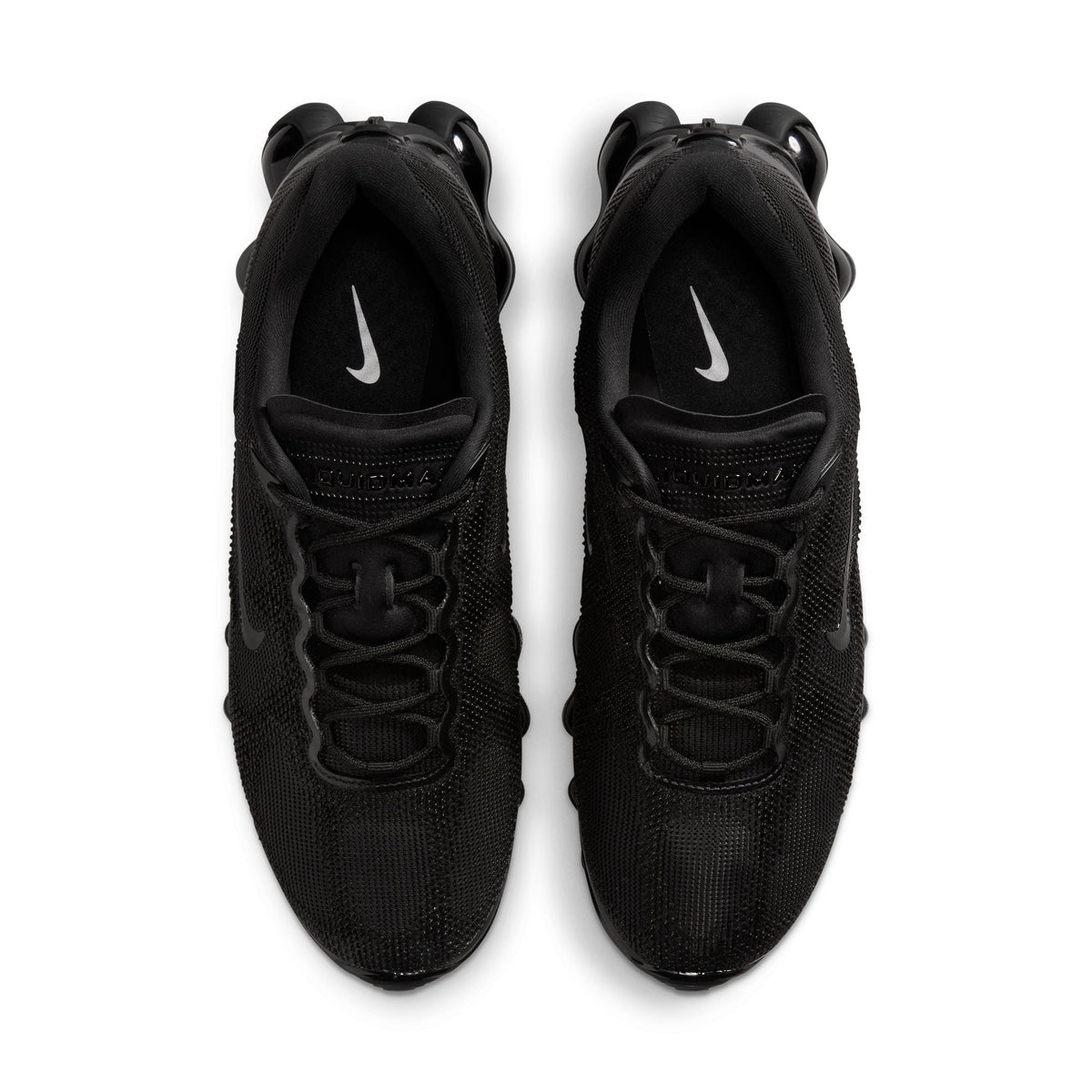 Black Nike Men's Air Liquid Max footwear, side view