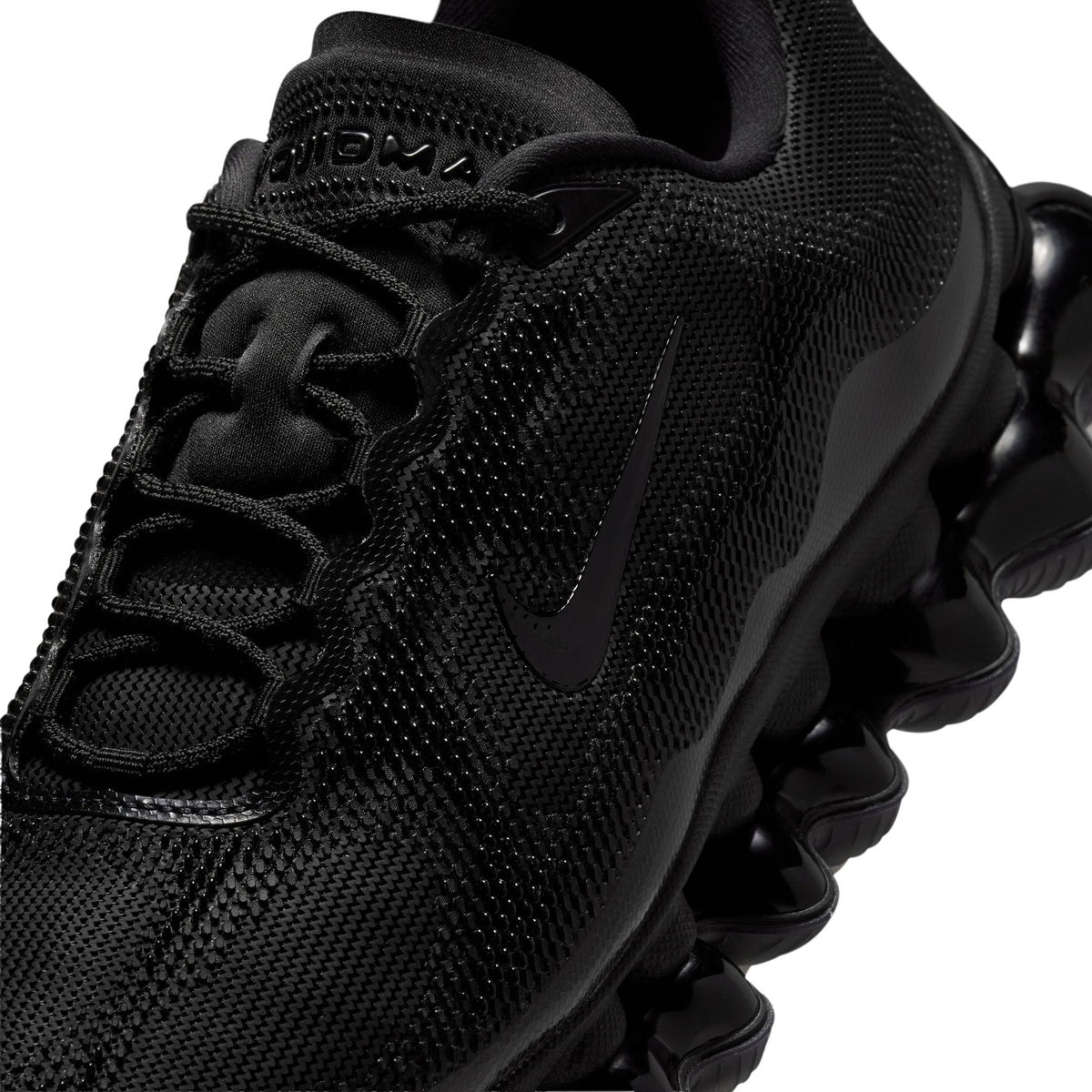 Black Nike men's Air Liquid Max footwear, side view