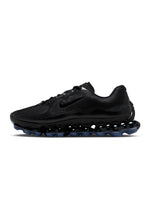 Nike men's Air Liquid Max black footwear showing sleek design and cushioning, ideal for athletic and casual wear.