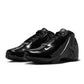 Nike men's Zoom Hyperflight black athletic shoes, showcasing sleek design and Nike branding on the black footwear.