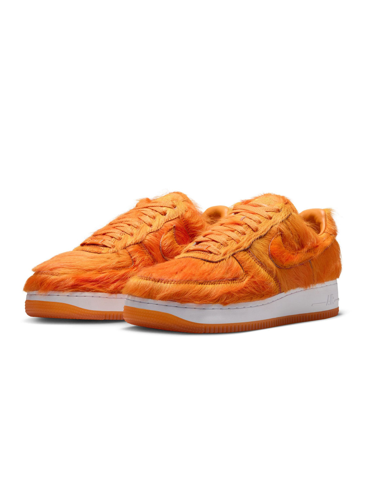 Nike Men's Air Force 1 orange pony hair sneakers, stylish men's footwear with textured pony hair finish.