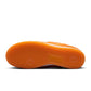 Nike men's Air Force 1 sneakers in orange pony hair, showcasing stylish footwear with a sleek design and textured upper.