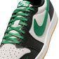 Men's Air Jordan 1 Retro Low Pine Green sneakers in a stylish low-top design, featuring green and black color accents.